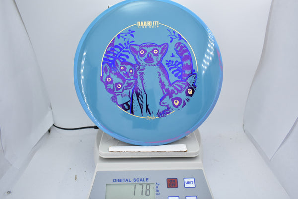 Wilderness Series Lemurgency - Neutron Hex - Blue/Purple Stamp - Nailed It Disc Golf